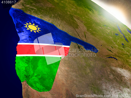 Image of Namibia with flag in rising sun