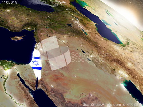 Image of Israel with flag in rising sun