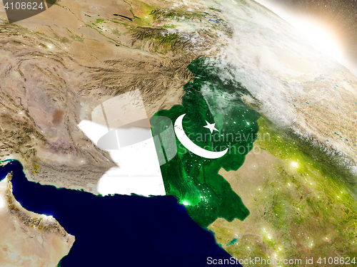 Image of Pakistan with flag in rising sun