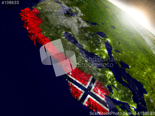 Image of Norway with flag in rising sun