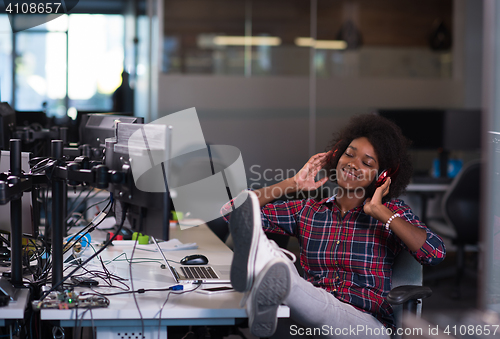 Image of portrait of a young successful African-American woman in modern 