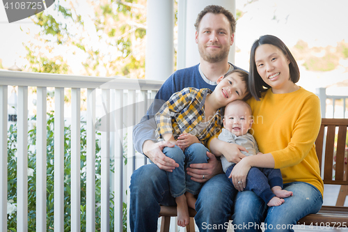 Image of Young Mixed Race Chinese and Caucasian Family Portrait