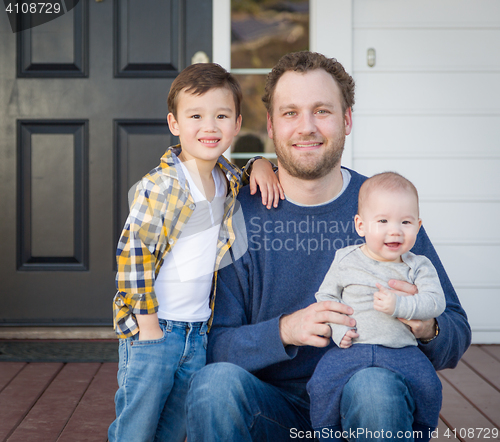 Image of Mixed Race Father and Sons on Front Porch