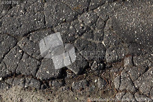 Image of asphalt broken closeup
