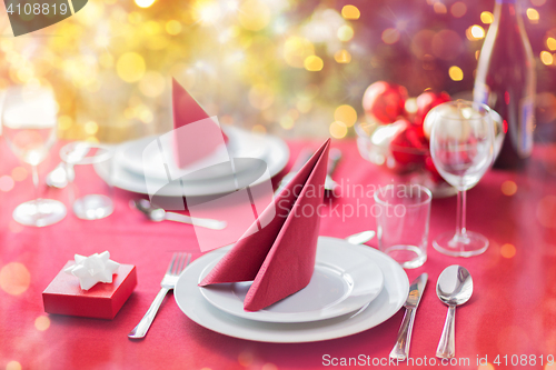 Image of room with christmas tree and decorated table