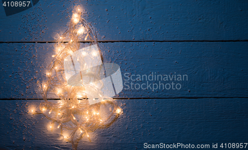 Image of Christmas card with luminous garland