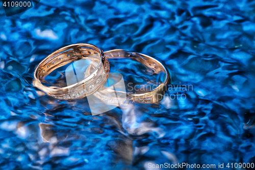 Image of Golden Rings In The Water