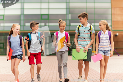 Image of group of happy elementary school students walking