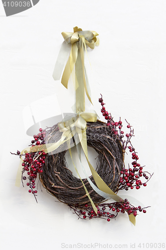 Image of Advent Christmas wreath on white door decoration