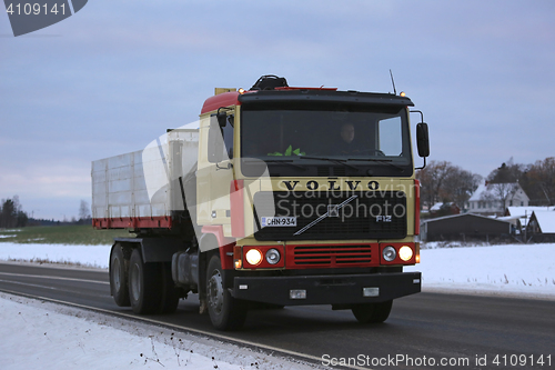 Image of Retro Volvo F12 Tipper Truck on a Winter Night