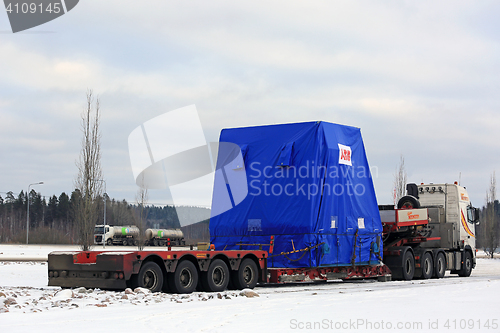 Image of Side view of Semi Truck Oversize Load Parked