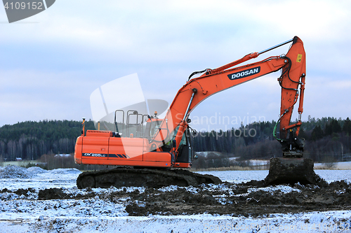 Image of Doosan Excavator at Work in Winter