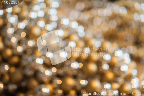 Image of blurred golden christmas lights bokeh