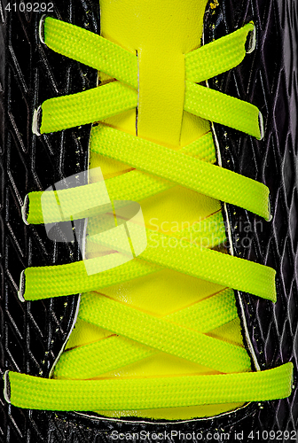 Image of Closeup of yellow laces