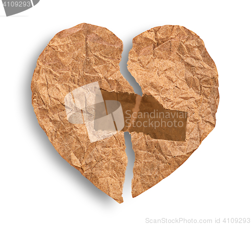 Image of Broken crumpled paper heart coupled with tape