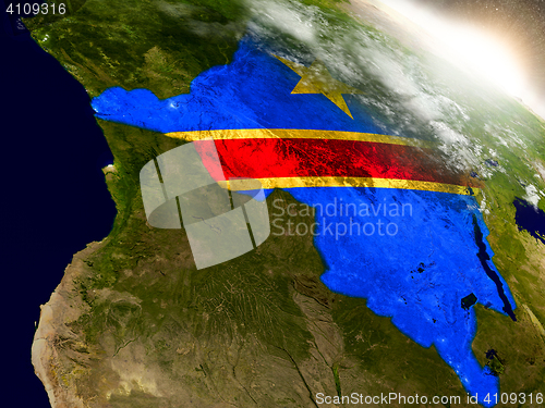 Image of Democratic Republic of Congo with flag in rising sun