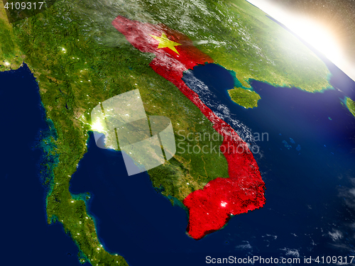 Image of Vietnam with flag in rising sun