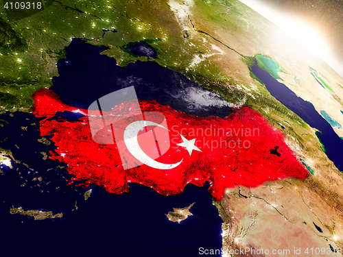 Image of Turkey with flag in rising sun