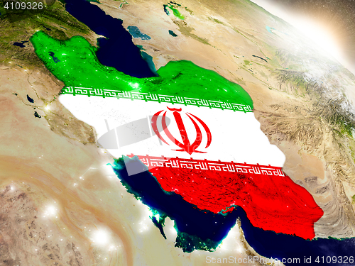 Image of Iran with flag in rising sun