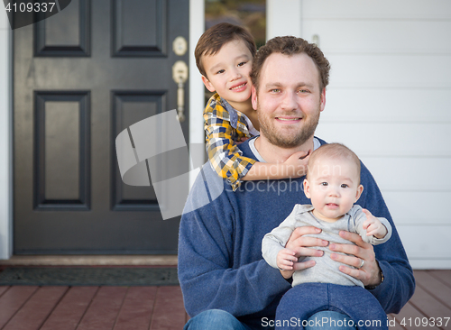 Image of Mixed Race Father and Sons on Front Porch