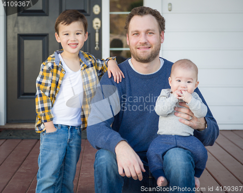 Image of Mixed Race Father and Sons on Front Porch