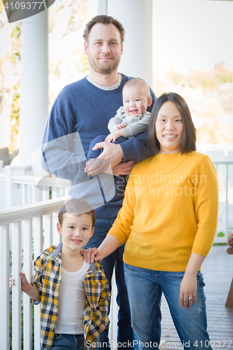 Image of Young Mixed Race Chinese and Caucasian Family Portrait