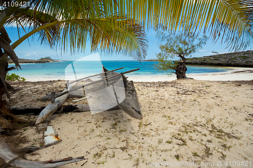 Image of abadoned boat in sandy beach in Antsiranana bay Madagascar