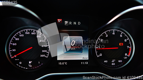 Image of Modern car speedometer. Close up shot of the dashboard