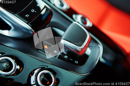 Image of Detail of modern car interior, gear stick