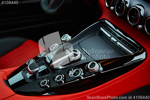 Image of Detail of modern car interior, gear stick