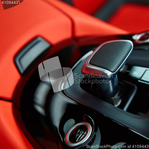 Image of Detail of modern car interior, gear stick