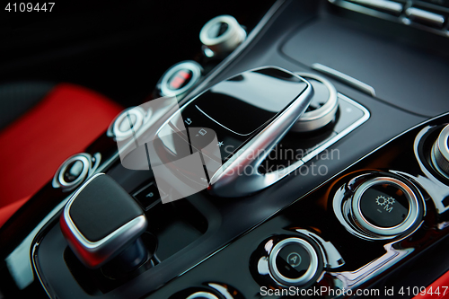 Image of Detail of modern car interior, gear stick