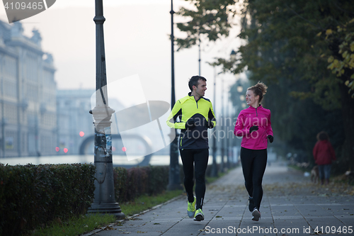 Image of young  couple jogging