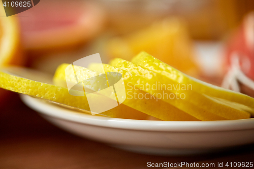 Image of close up of lemon slices on plate