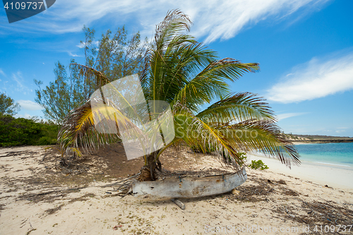 Image of abadoned boat in sandy beach in Antsiranana bay Madagascar