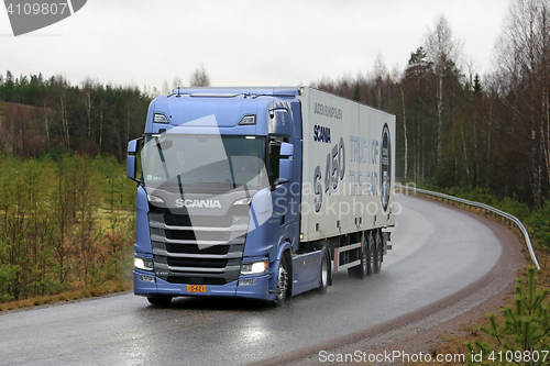 Image of Blue Scania S450 Semi Next Generation Truck on the Road