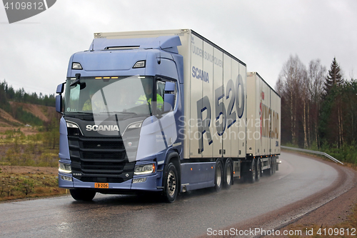 Image of New Next Generation Scania R520 Trailer Truck on Rainy Road