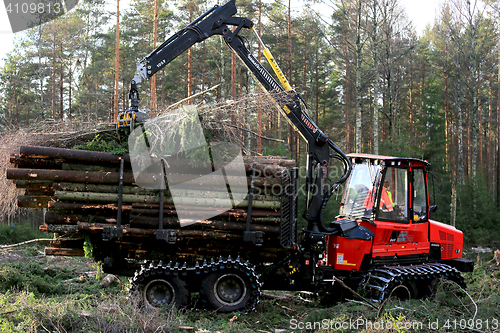 Image of Komatsu Forwarder at Work in Forest