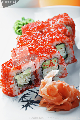 Image of California roll with crab and tobico closeup