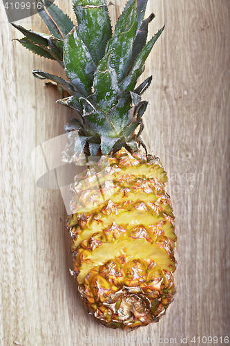 Image of Sliced pineapple on cutting board
