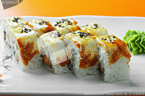 Image of Canada roll with salmon and eel closeup