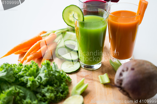 Image of glasses with different fruit or vegetable juices