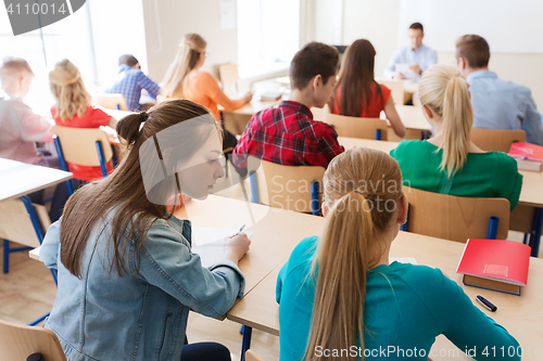 Image of group of students writing school test