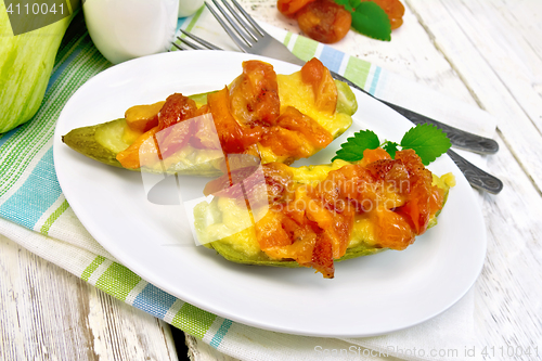 Image of Courgettes in spicy sauce on light board