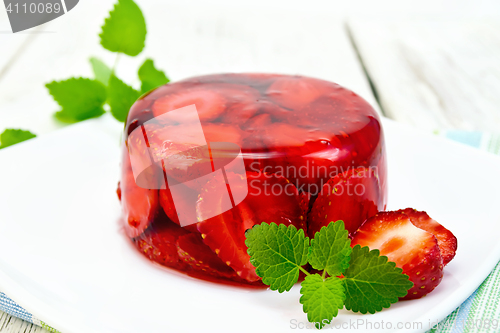 Image of Jelly strawberry with mint on table