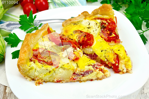 Image of Flan with tomato and zucchini on light board