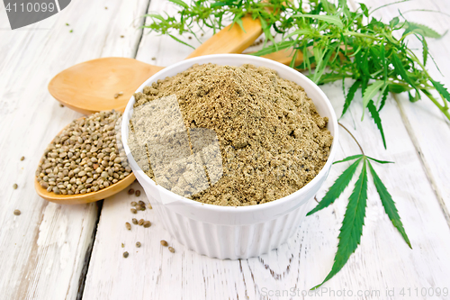 Image of Flour hemp in bowl with spoons on light board