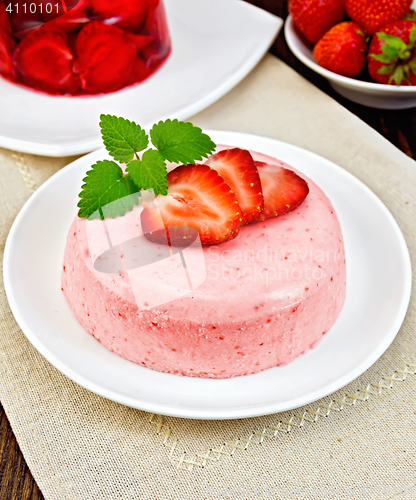 Image of Panna cotta strawberry with mint on napkin