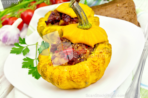 Image of Squash yellow stuffed in plate on board