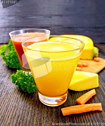 Image of Juice pumpkin and carrot with parsley on board
